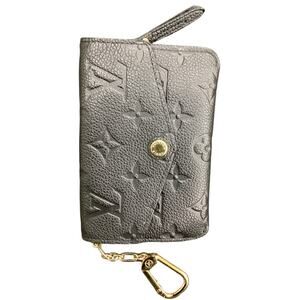 Never Used Louis Vuitton Key Pouch 1Size Imprinted Logo Gold Tone Hardware Black